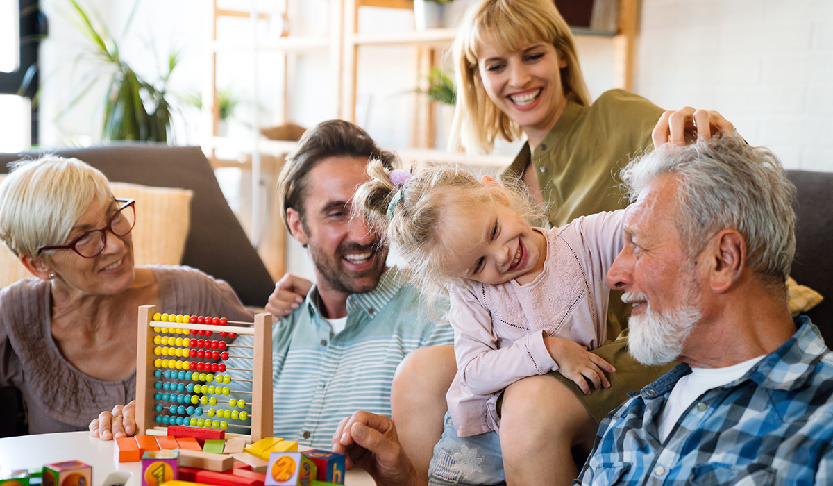 A healthy, multi-generation family having fun with each other.